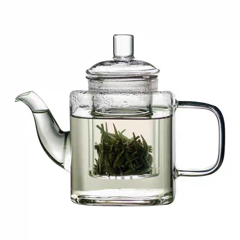 small glass teapot kettle with infuser