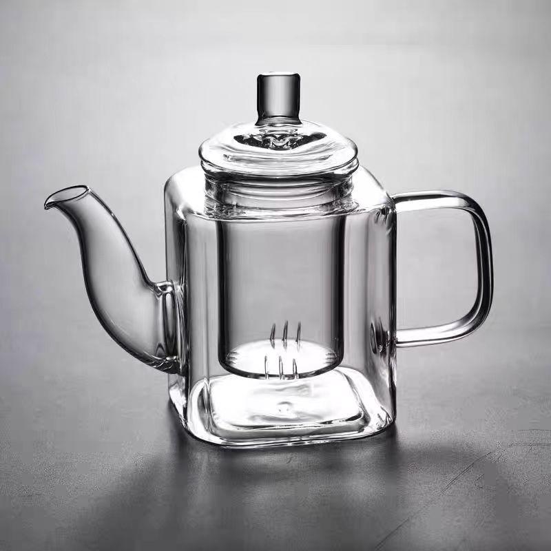 small glass teapot kettle with infuser