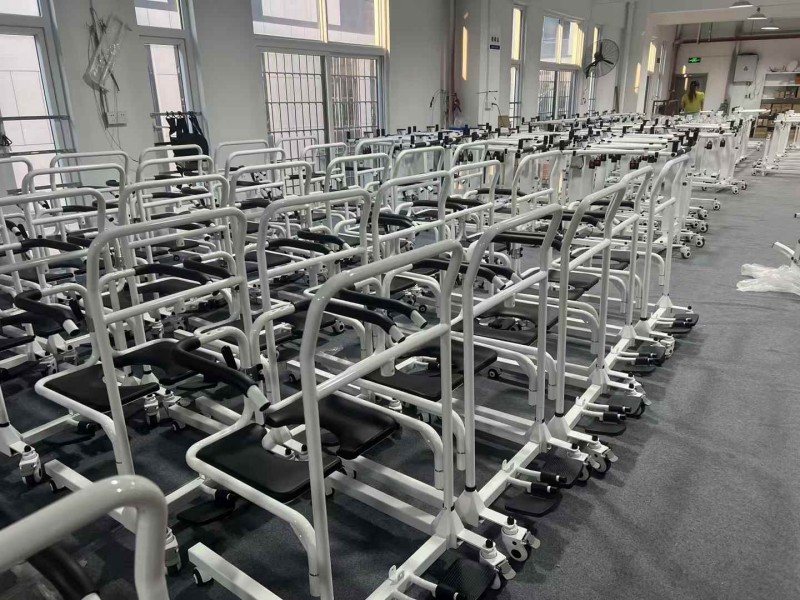 Customer Performs Pre-Shipment Inspection on Transfer Chairs at Our Factory