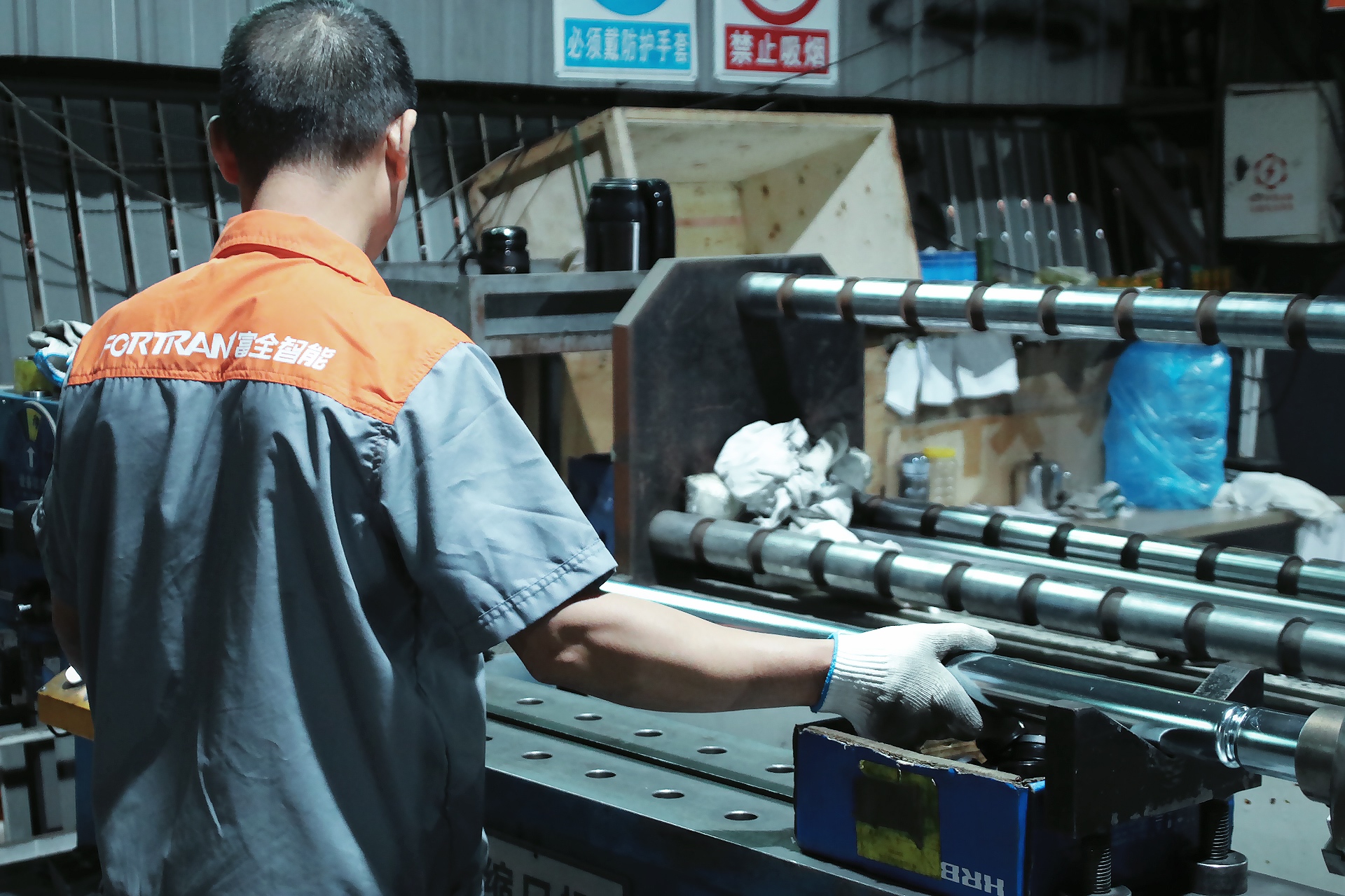 Manufacturing of rubber-coated rollers.