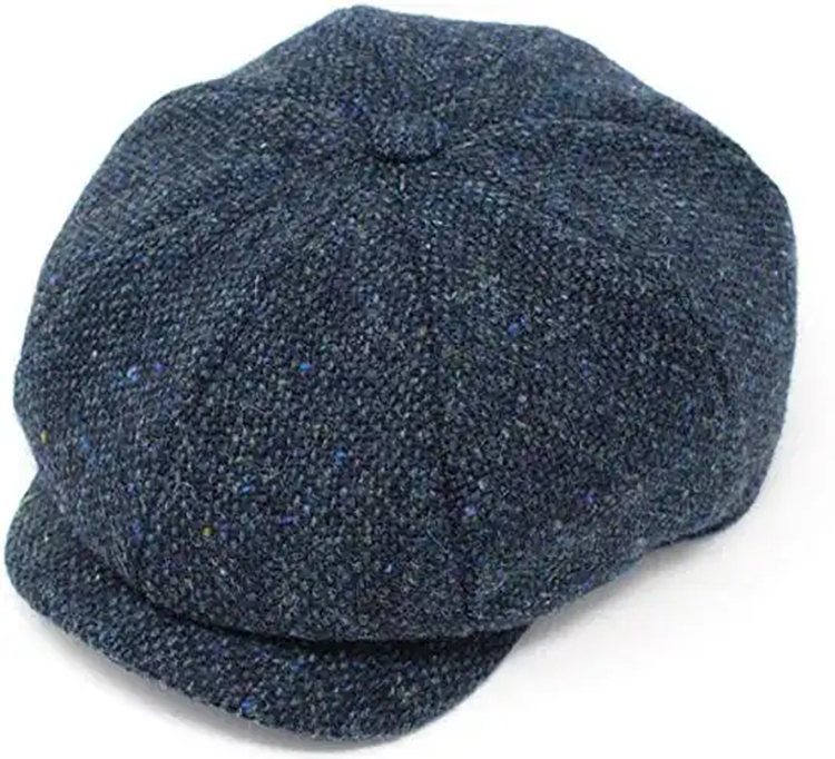Newsboy Cap: Työntekijöiden päivittäisestä pukeutumisesta muotisuosikkiin Newsboy Cap: Työntekijöiden päivittäisestä pukeutumisesta muotisuosikkiin