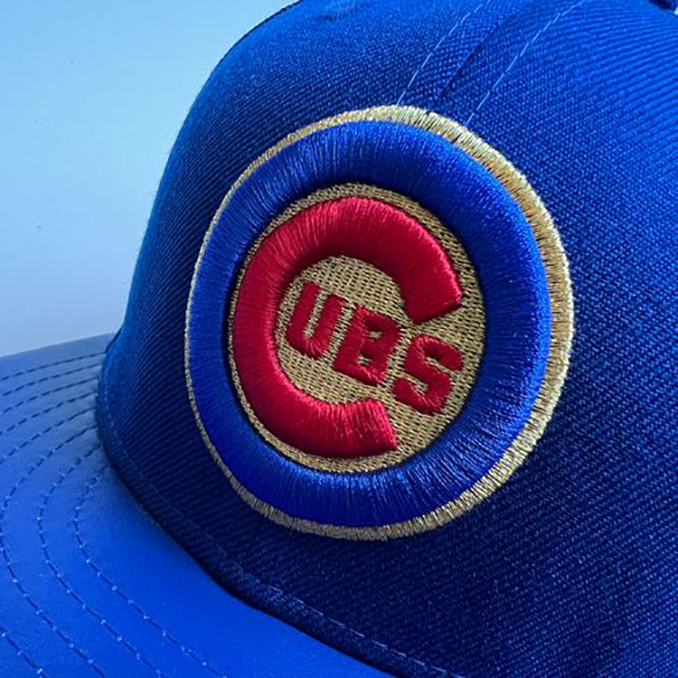 the baseball caps of the Chicago Cubs