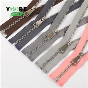 Decorative metal-toothed zipper