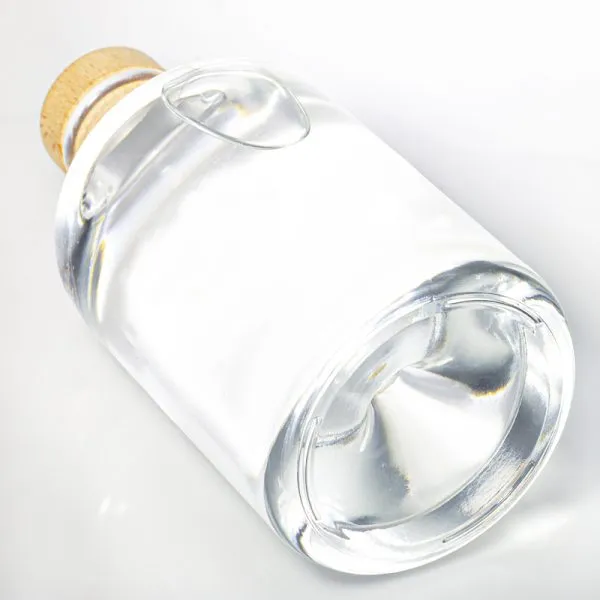 Custom 500ml fancy liquor glass bottle with sealed cork lid