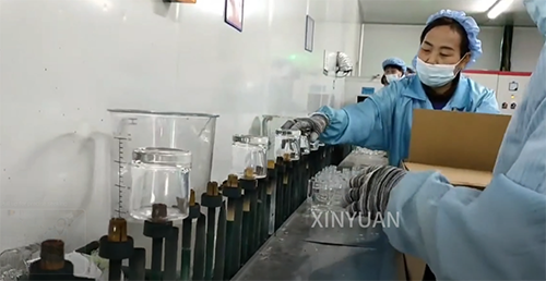 The glass wine bottles ordered by British customers are being produced at a rapid pace video