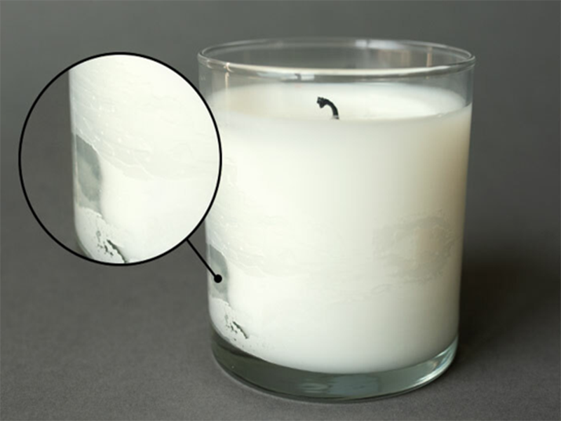 What Causes Ripples and Depressions on the Surface of a Candle?