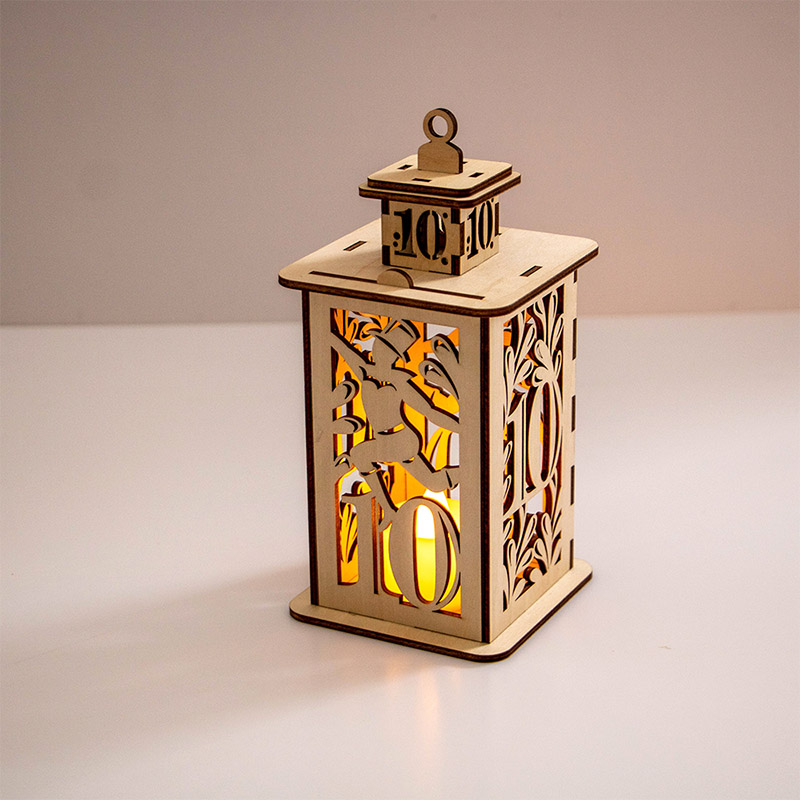 Handmade candlelit glow wooden Christmas lanterns decorated for Christmas