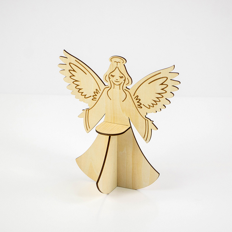 Vintage style wooden angel candlesticks add a Christmas vibe to the wooden decor