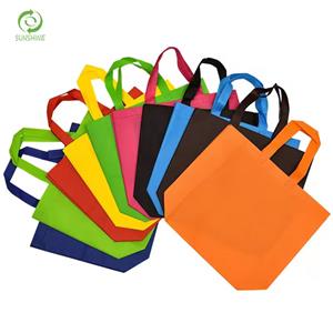 Cheap reusable customized new printed Logo tote nonwoven shopping bags 100%pp nonwoven fabric handle colorful bags