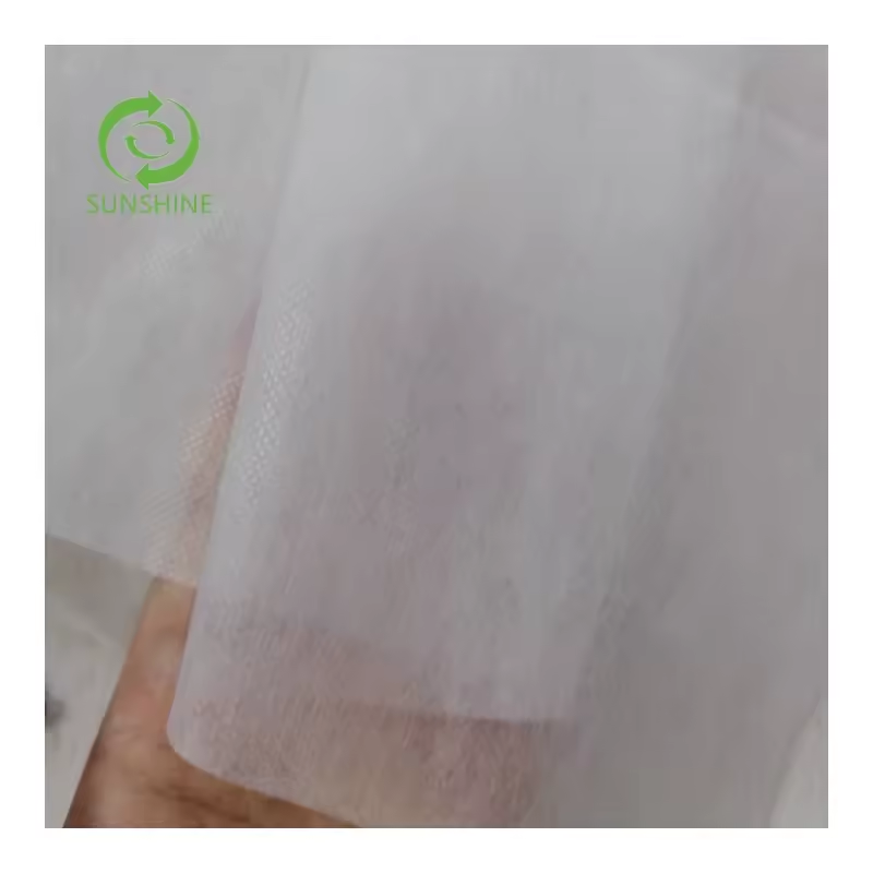 Good quality 20gsm 100% Polyester (PET) sesame dot pattern spunbond hot-rolled non-woven fabric roll pet nonwoven fabric