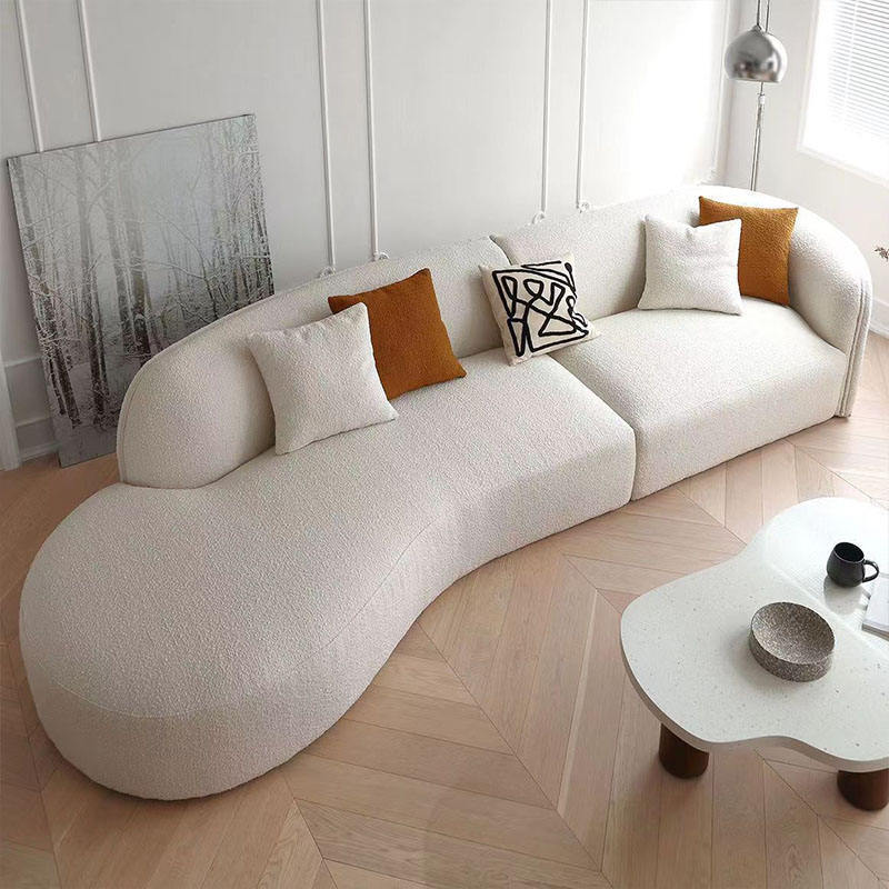 أريكة منحنية بثلاثة مقاعد مصنوعة من قماش مخملي