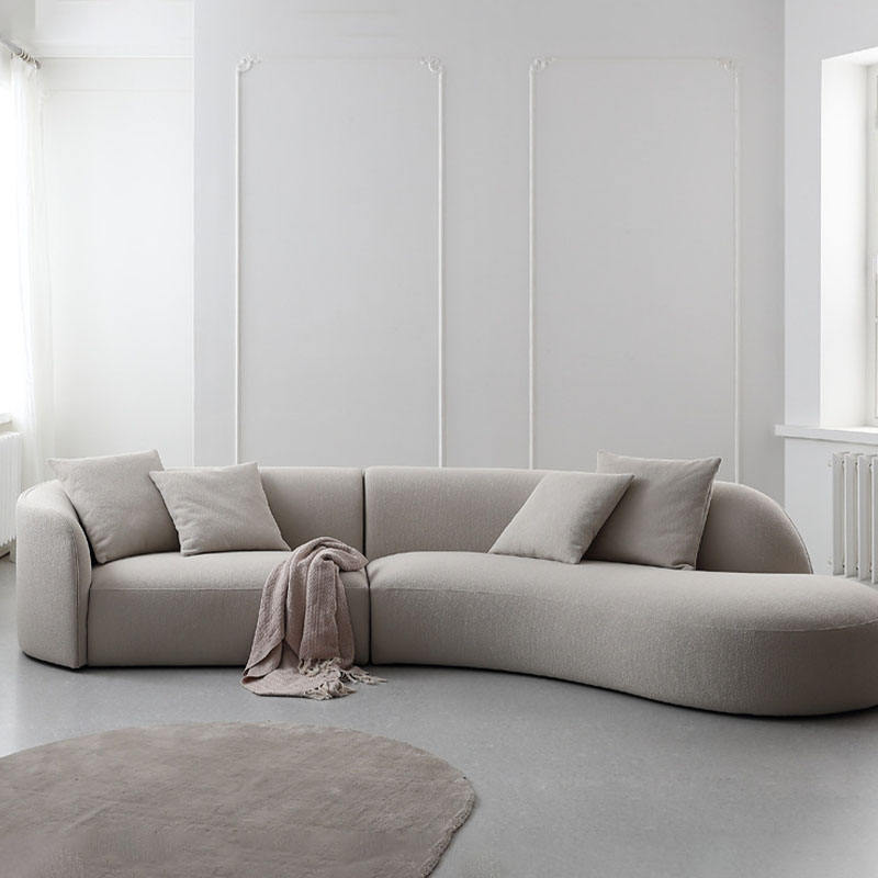 أريكة منحنية بثلاثة مقاعد مصنوعة من قماش مخملي