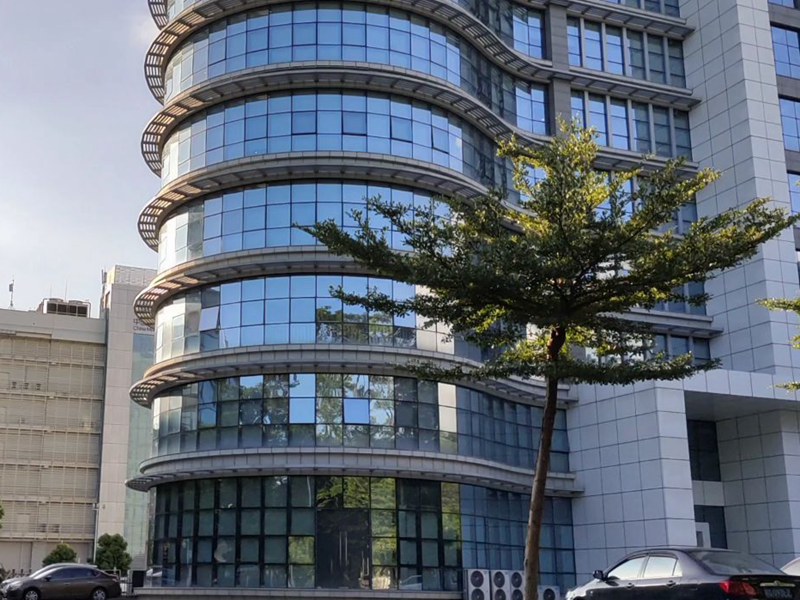 Enhancing Architectural Aesthetics with Blue Curved Toughened Glass