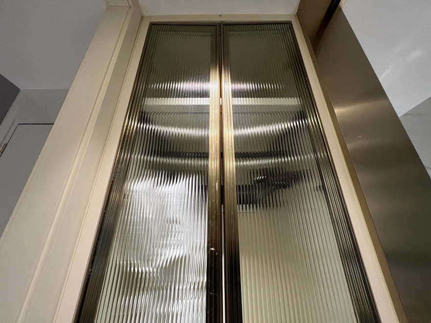 Decorated glass door