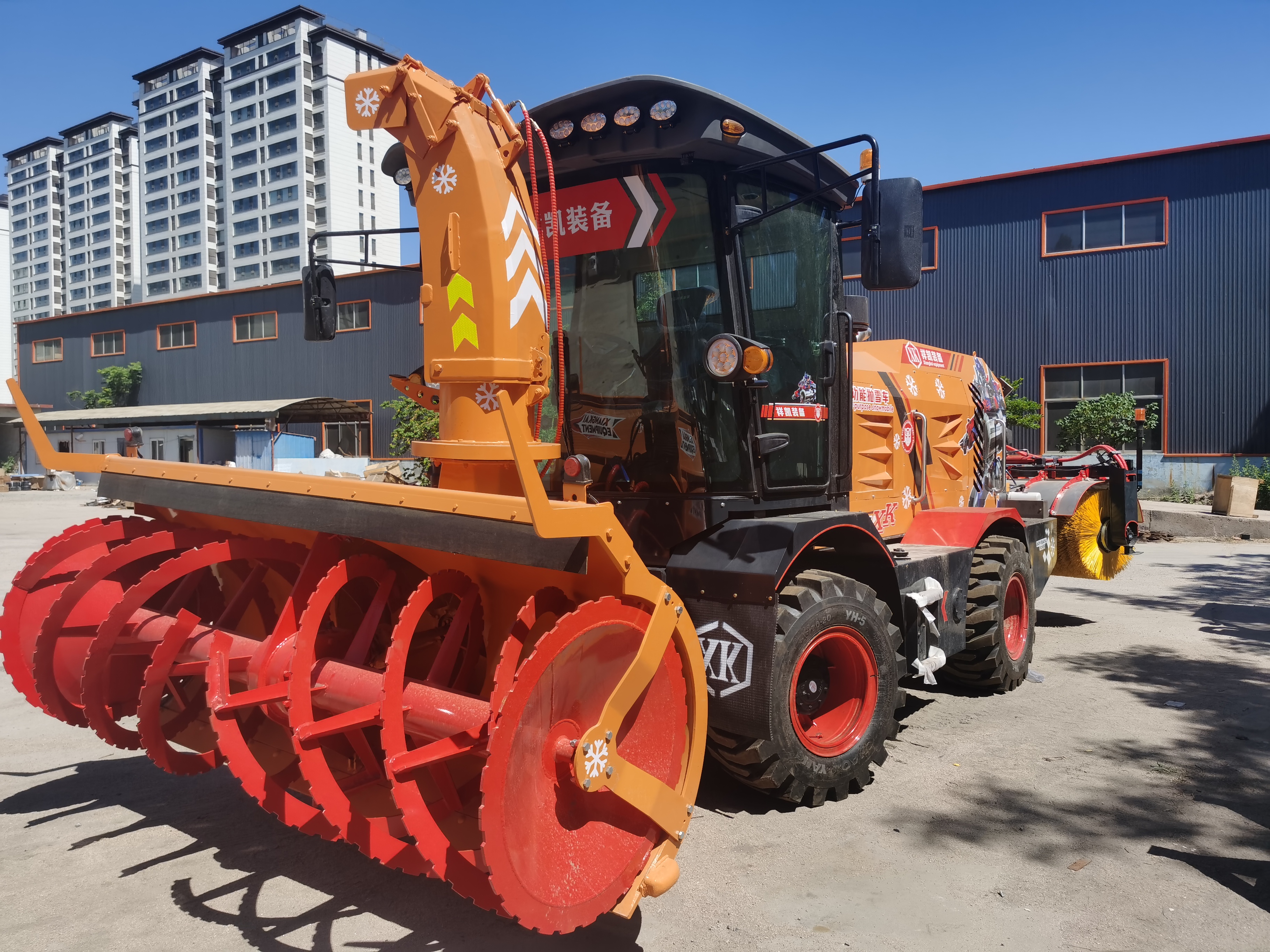 multi-functional snow throwing and snow removal vehicle