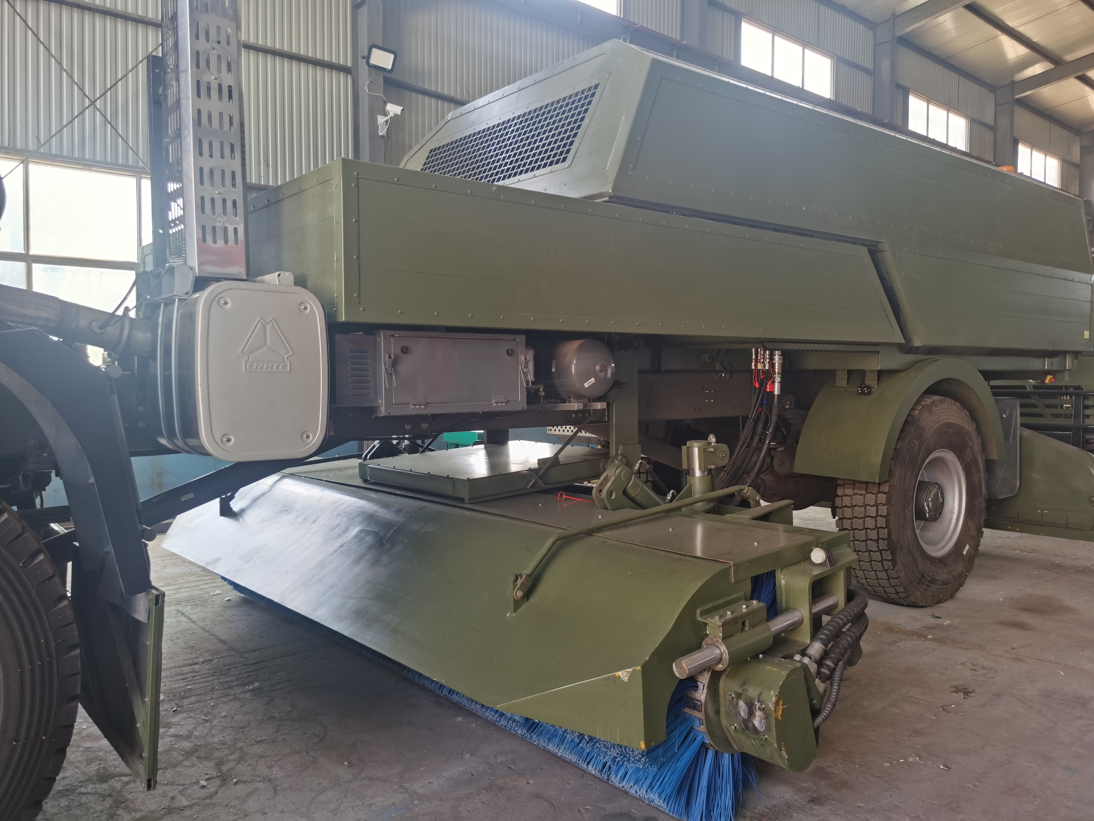large multi-functional snow removal vehicle
