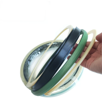 MCPS Type Piston Seal consistes of a filled PTFE Cap T Shaped NBR Cushion Nylon Backup Ring For High Pressure Heavy Machines