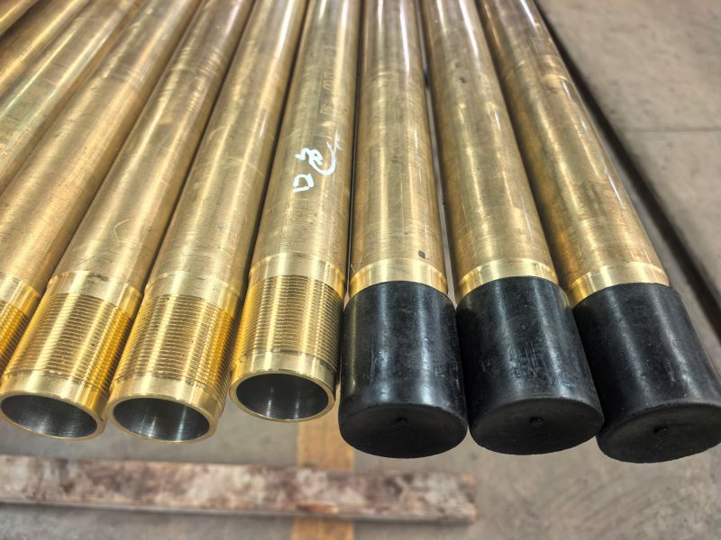 Case Study: Custom Brass Pump Barrels for Highly Corrosive Oil Wells