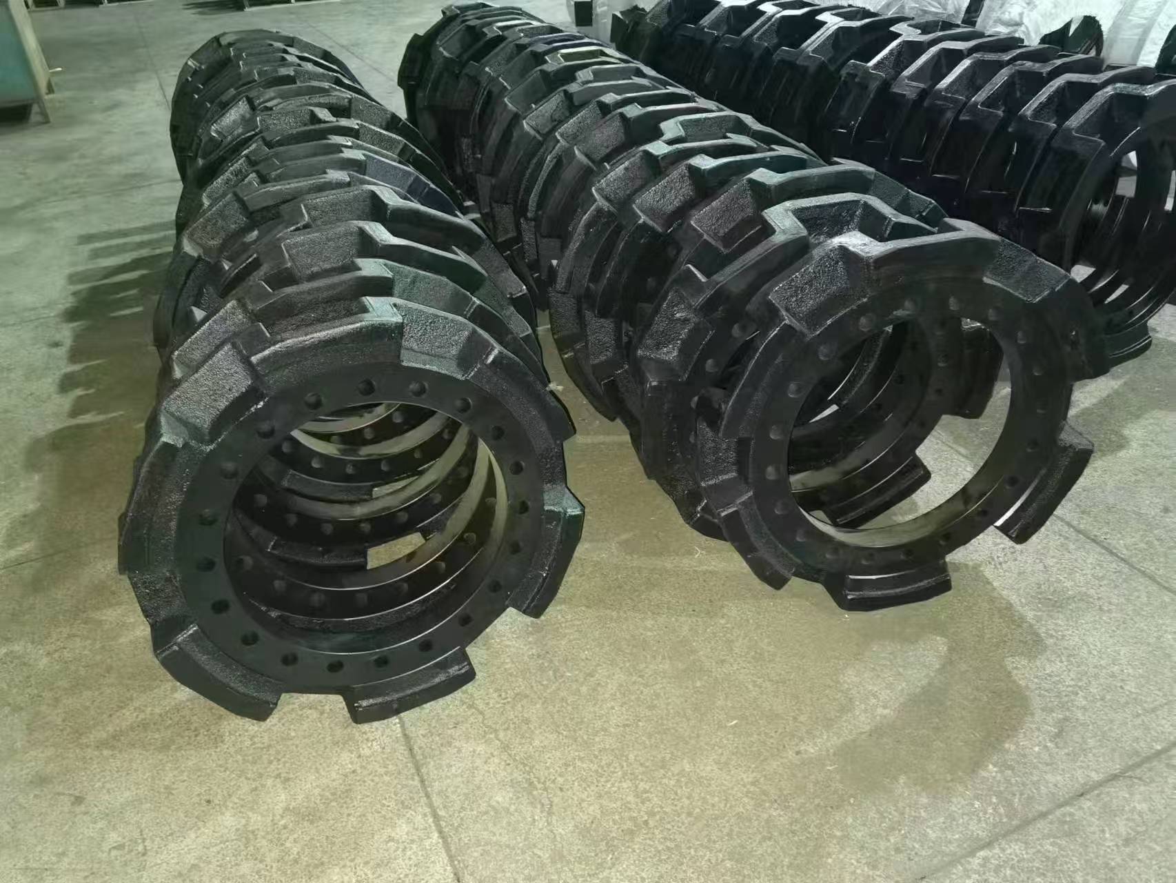 Sprockets and segments for excavators