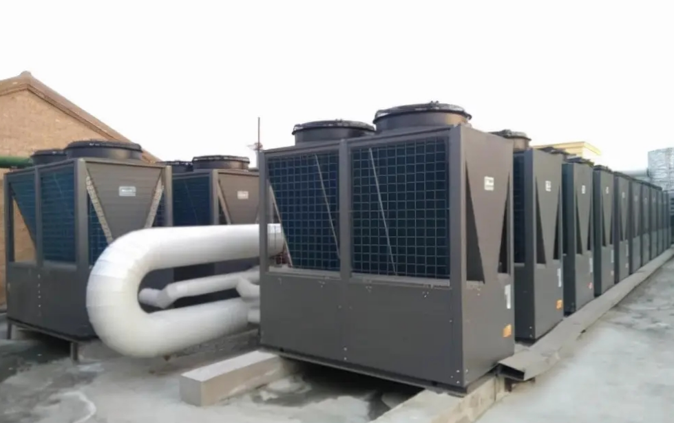 Why has the air-source heat pump been chosen as the clean energy solution for both rural and urban areas?
