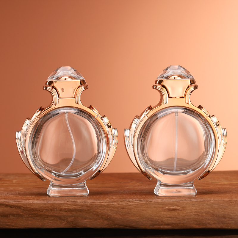 Botella de perfume de lujo estilo cristal con tapa decorativa