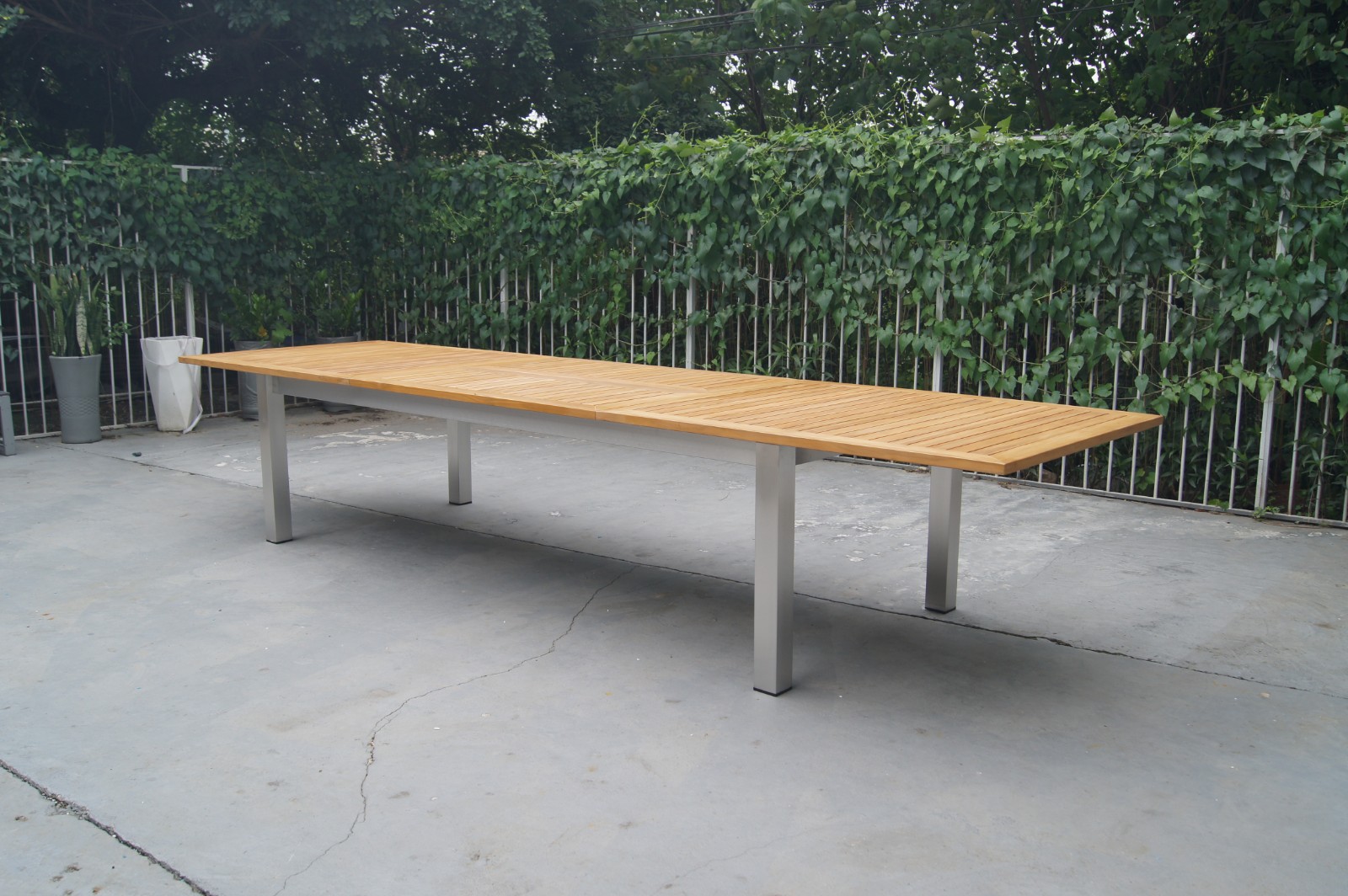 teak extendable outdoor dining table