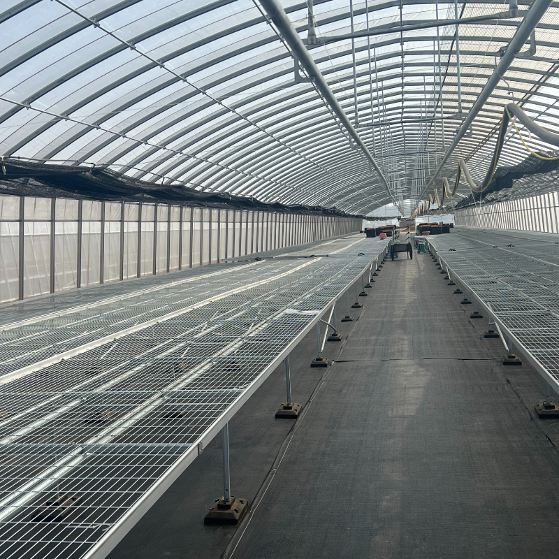 The working principle of the wet curtain-fan system is simple yet efficient.