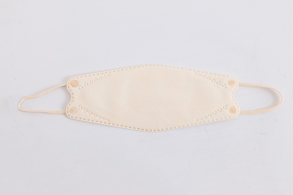 Four layer non-woven mask