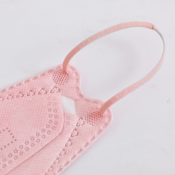 Four layer non-woven mask