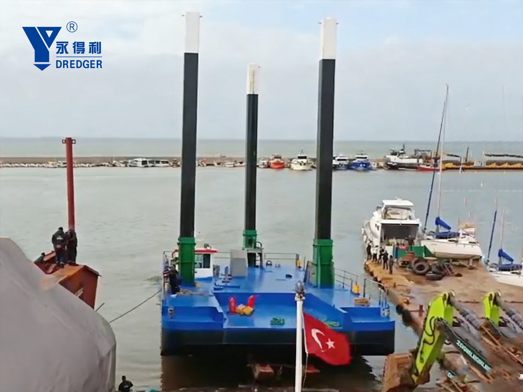 Our backhoe dredger launches into the water successfully