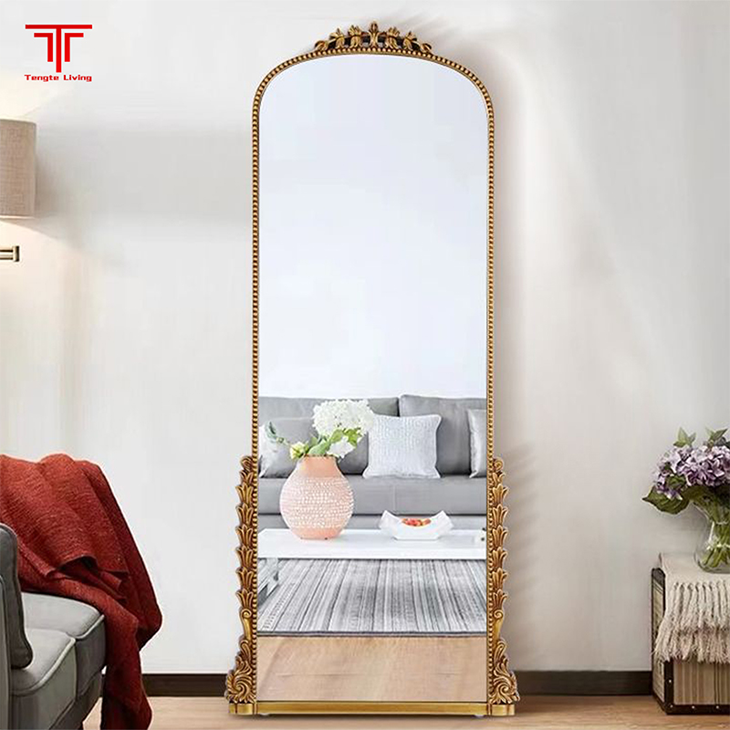 large gold framed mirror