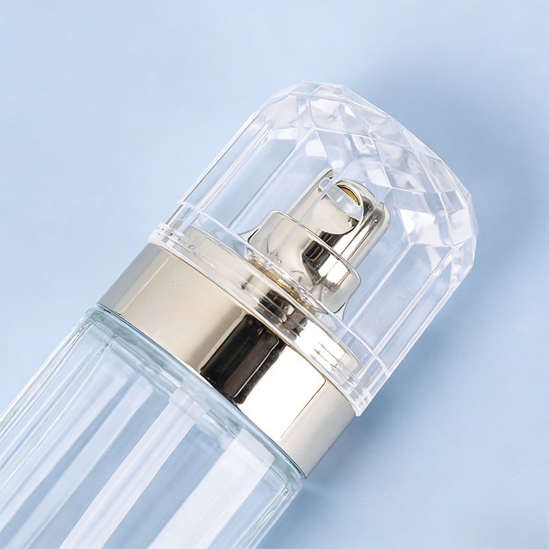 Faceted Cylindrical Glass Cosmetic Bottle