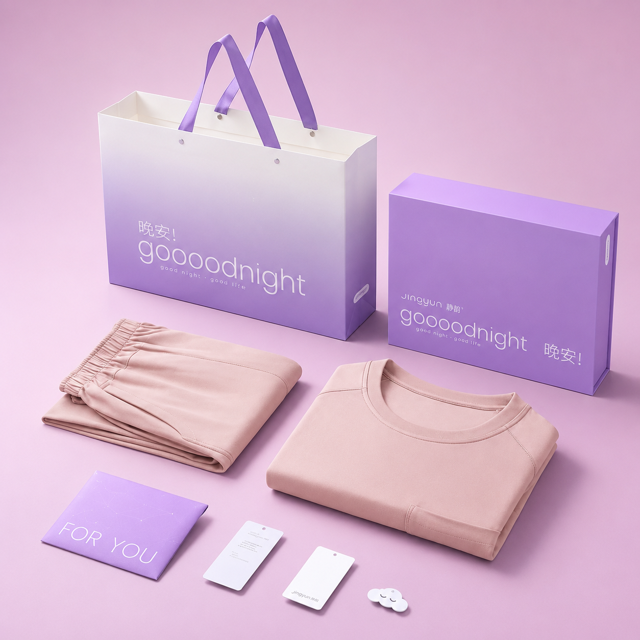 Conjunto de pijama personalizado em caixa de presente com sacola de papel.