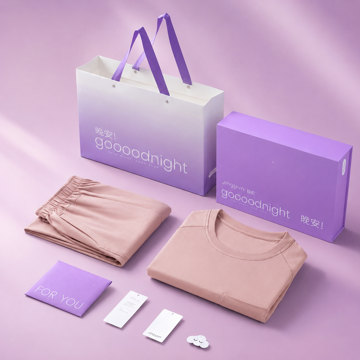 Conjunto de pijama personalizado em caixa de presente com sacola de papel.