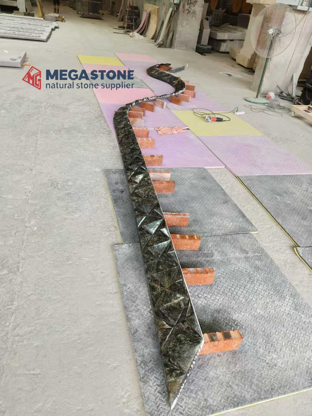 Metalicus Granite Curved Water Feature with Diamond‑Shaped Facet Carvings S Shape Cascading Fountain for Landscape Project