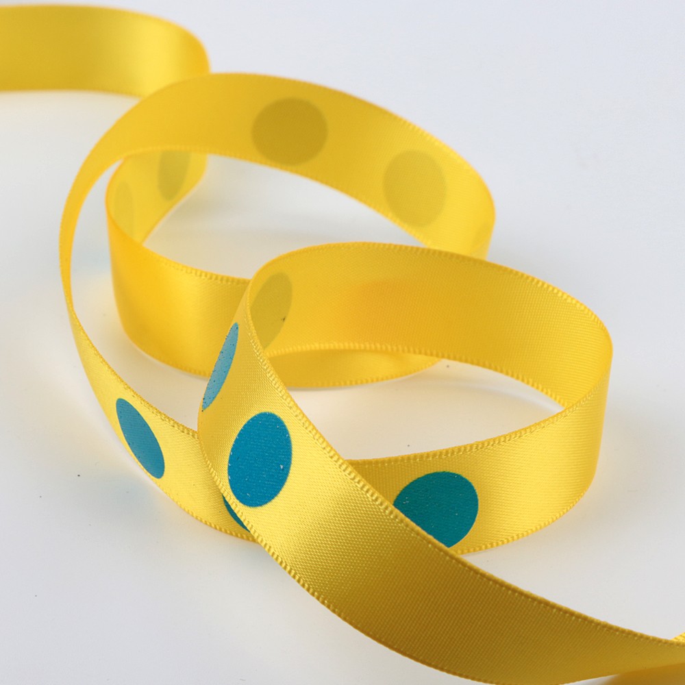 Ruban imprimé stock ruban tache jaune imprimé avec un point bleu