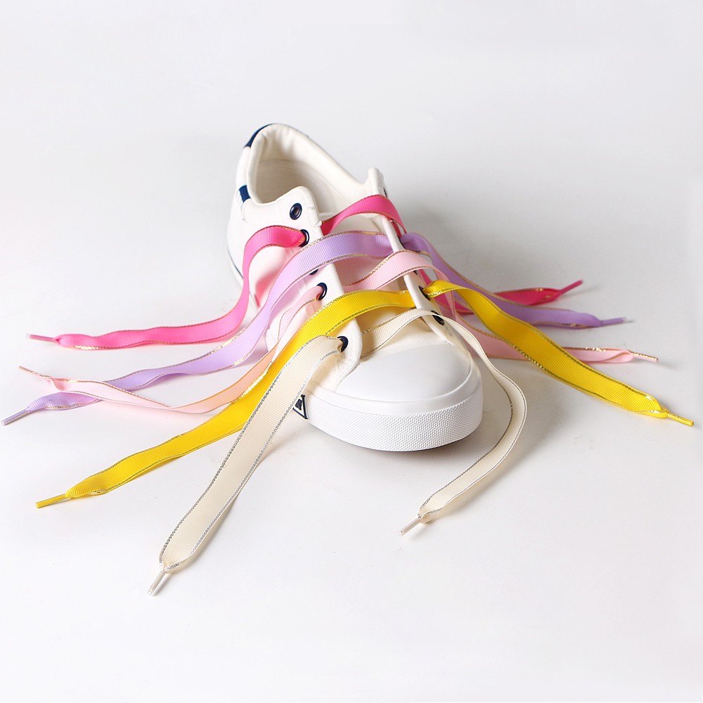 Custom made ribbon shoelaces made by gold edge metallic grosgrain ribbon