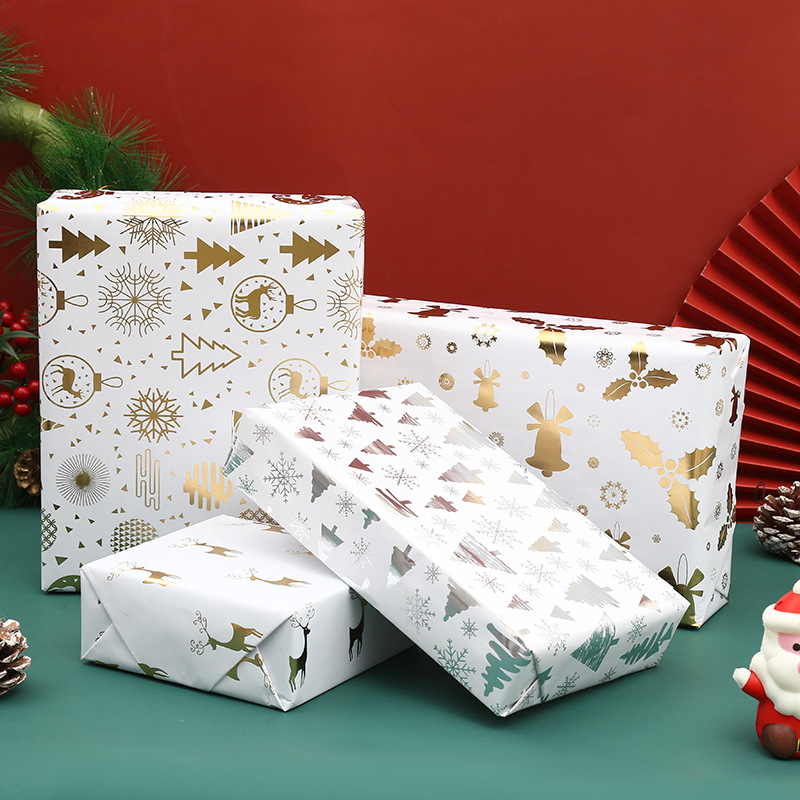 Emballage cadeau de Noël en feuille d'or