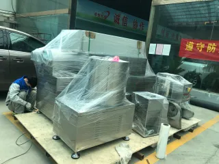 Malezya müşterimiz için şişirilmiş atıştırmalık yiyecek yapma makinesi hattı yükleniyor